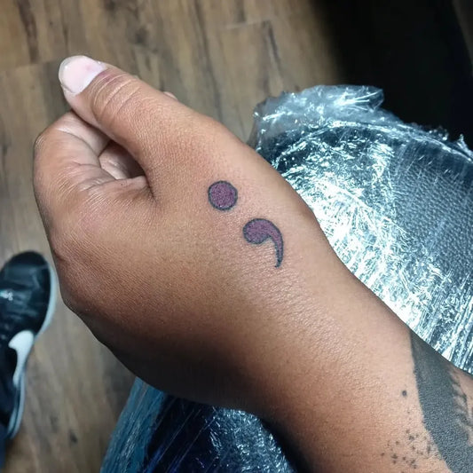 Small Minimalist Semicolon on Men Hand Tattoo by @tattoosbytoro