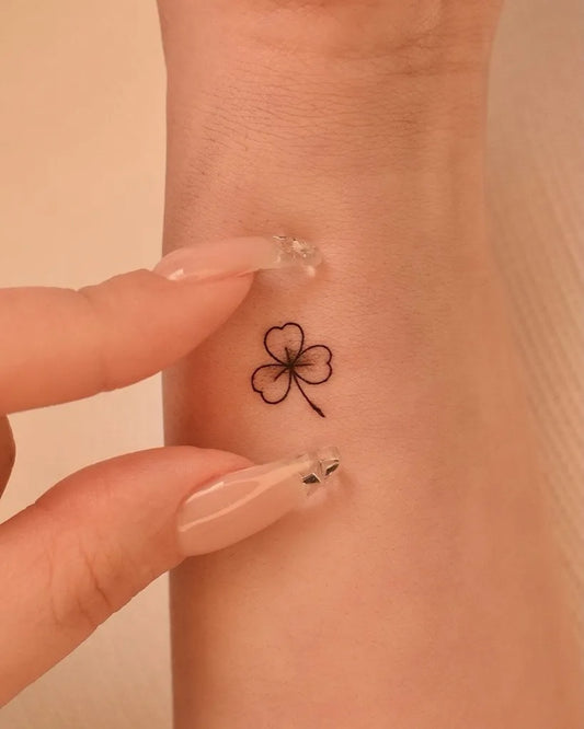 Small Minimalist Shamrock on Women Wrist Tattoo by @tinytattooinc