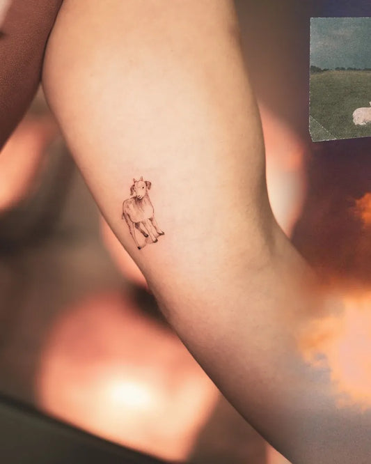 Small Minimalist Sheep on Women Arm Tattoo by @_aiml