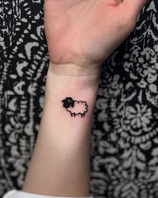 Small Minimalist Sheep on Women Wrist Tattoo by @leartistry_ink