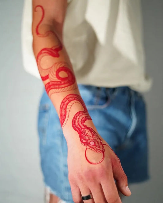 Small Minimalist Snake on Men Arm Tattoo by @seoulinktattoo