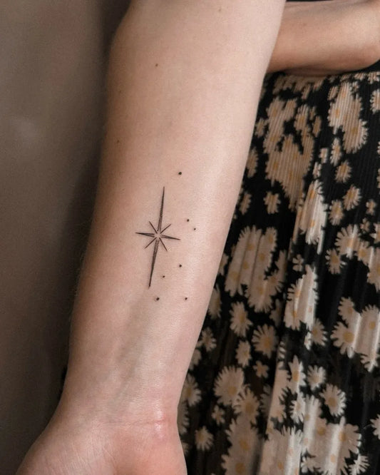 Small Minimalist Star Tattoo on Women Arm by @libertyjtattoo