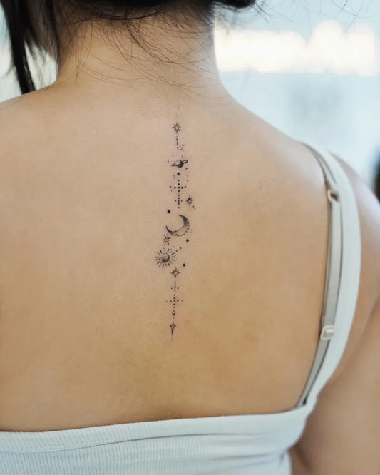 Small Minimalist Stars Moon Planets on Women Spine Tattoo by @baronart_helen