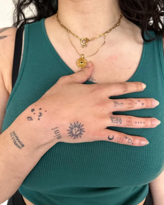 Small Minimalist Stars Sun Moon on Women Hand Tattoo by @mafaldaccamacho