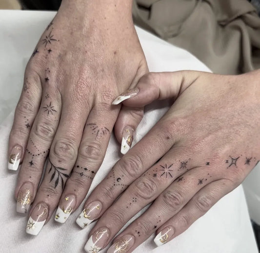 Small Minimalist Stars and Vines on Women Fingers Tattoo by @tashacope.tattoo