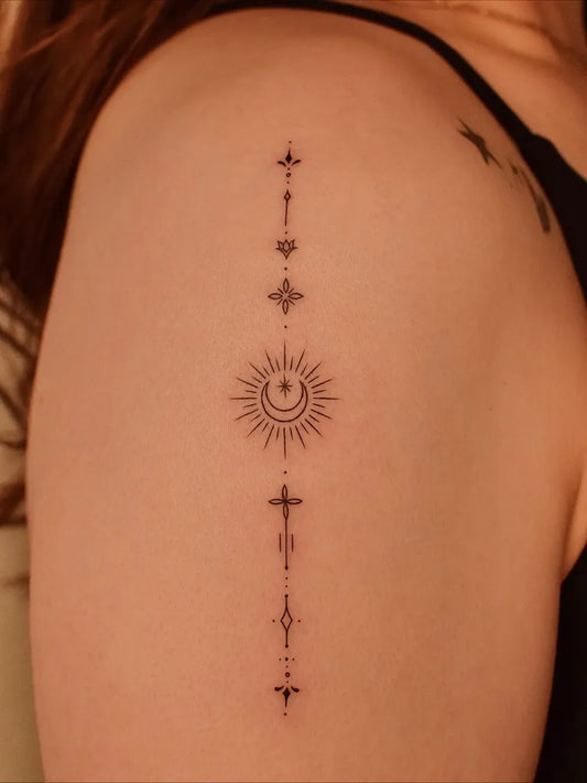 Small Minimalist Sun Cross Stars on Women Arm Tattoo by @tattooer_jina