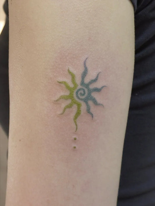 Small Minimalist Sun Mandala on Women Arm Tattoo by @namaste_poke