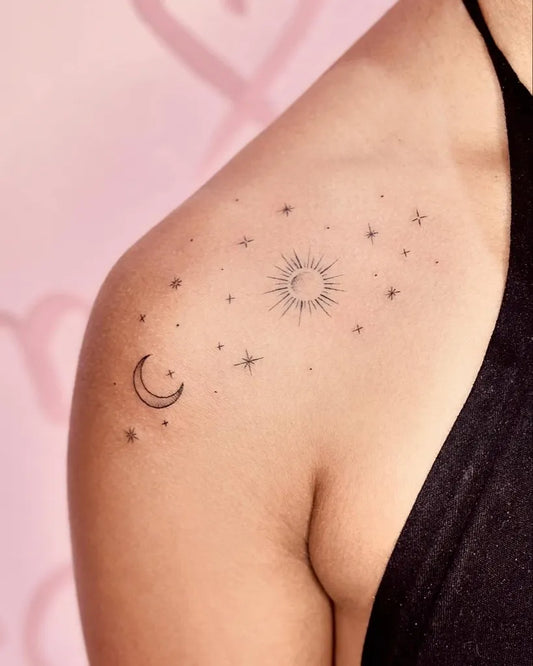 Small Minimalist Sun Moon Stars on Women Shoulder Tattoo by @lauralaporaestattoo