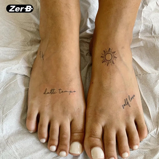 Small Minimalist Sun Script Selflove on Women Feet Tattoo by @zerbi_tattoo