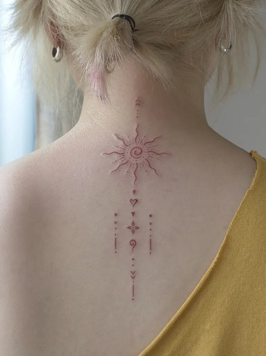 Small Minimalist Sun Symbols on Women Back Tattoo by @namaste_poke