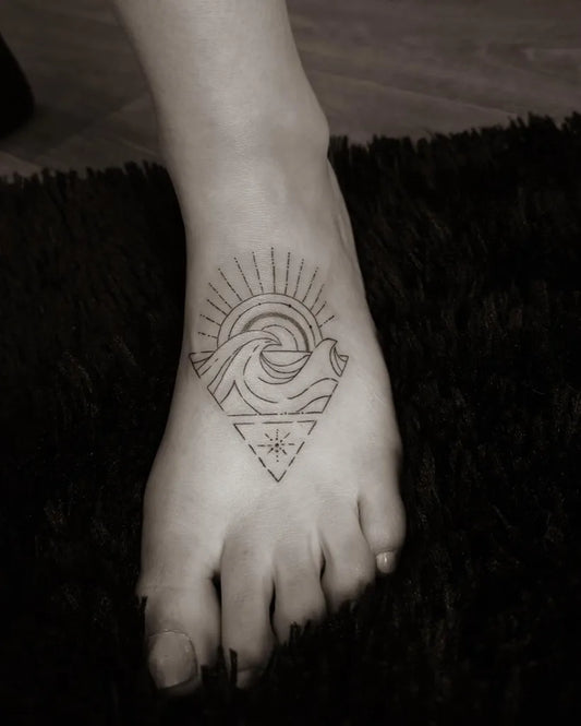 Small Minimalist Sun Wave Triangle Tattoo on Women Foot by @daintygarden.ink