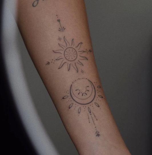 Small Minimalist Sun and Moon on Women Arm Tattoo by @shari_tattooer