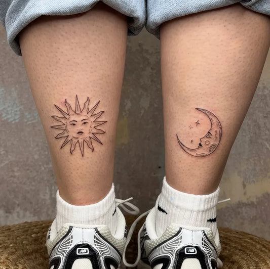 Small Minimalist Sun and Moon on Women Legs Tattoo by @moonshinegarden.tattoo
