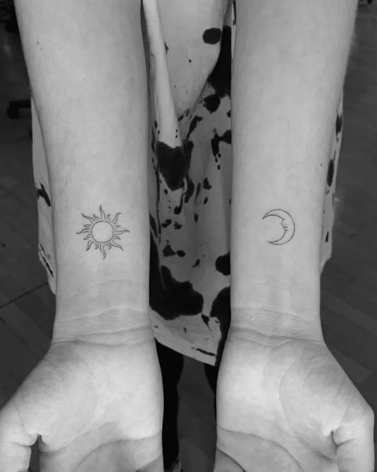 Small Minimalist Sun and Moon on Women Wrist Tattoo by @tiff.ink