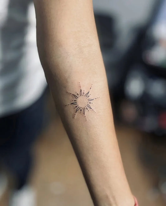 Small Minimalist Sun on Women Arm Tattoo by @artinktouch