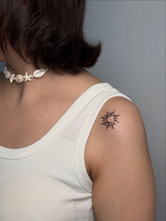 Small Minimalist Sun on Women Shoulder Tattoo by @mobitattoo
