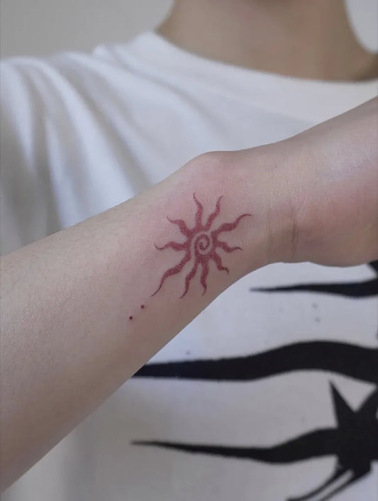 Small Minimalist Sun with Dots on Women Wrist Tattoo by @namaste_poke