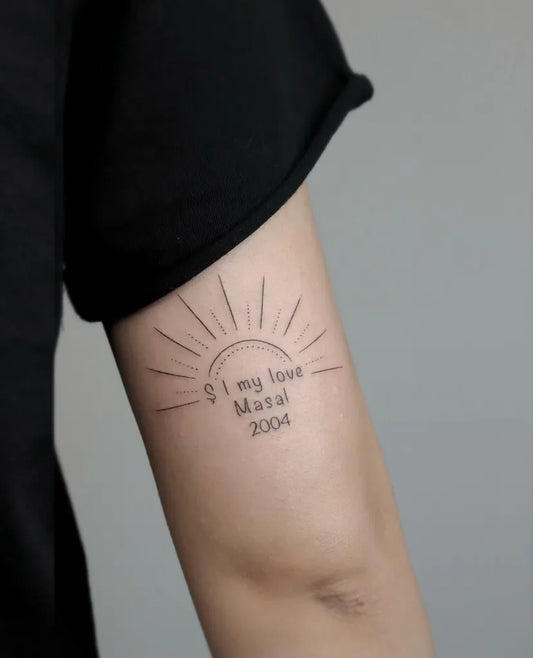 Small Minimalist Sun with Text on Women Arm Tattoo by @tude.ink
