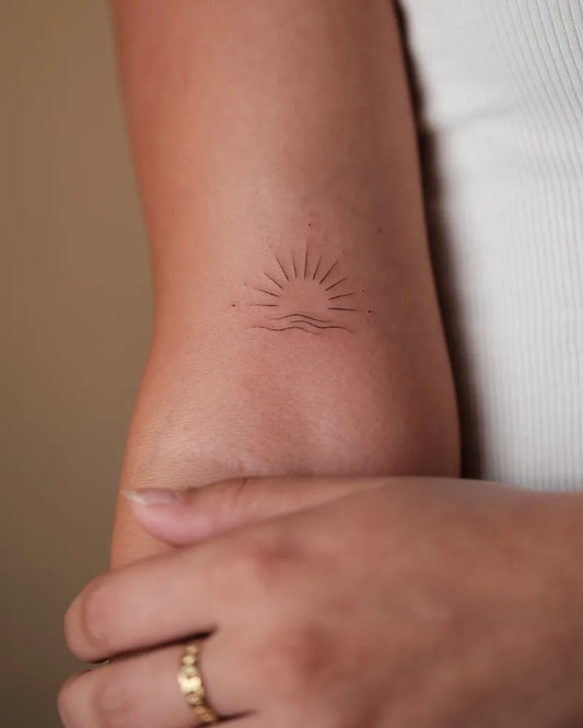 Small Minimalist Sunrise on Women Arm Tattoo by @i_tats_