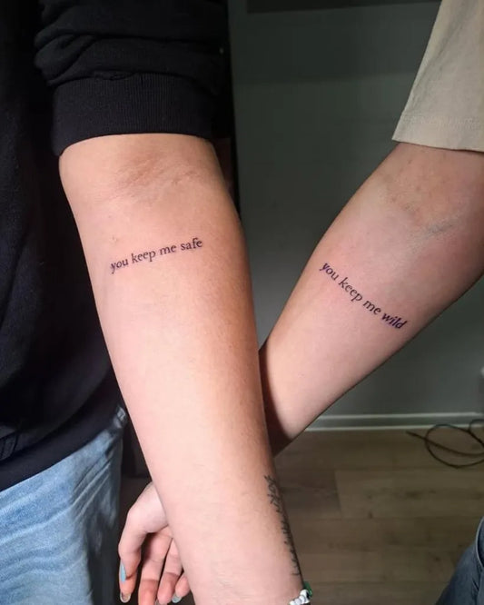 Small Minimalist Text on Couple Arms Matching Tattoo by @funky_tattoo_bucuresti