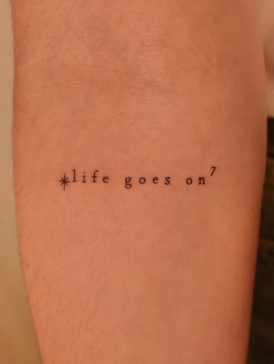 Small Minimalist Text with Asterisk on Women Arm Tattoo by @tinytattooinc
