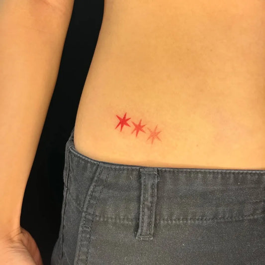 Small Minimalist Three Red Stars Tattoo on Women Hip by @kalechiptatts