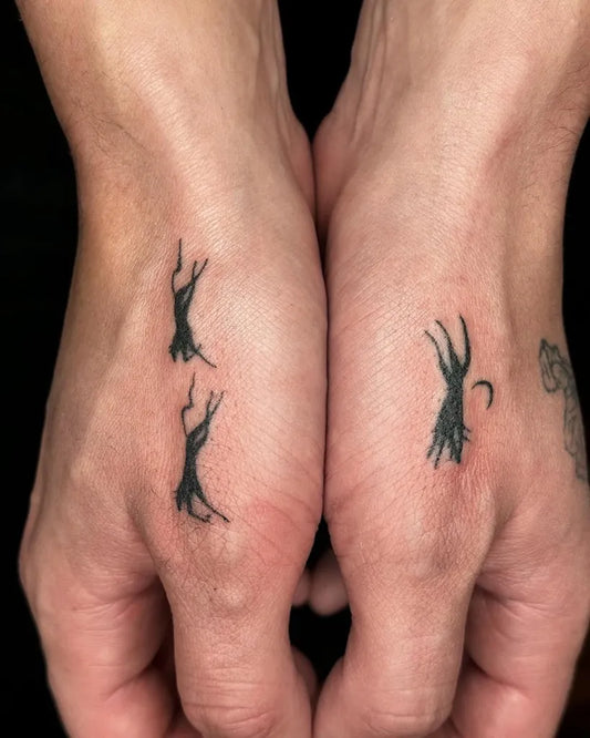 Small Minimalist Tree Branches on Men Hands Tattoo by @yarik.taboo