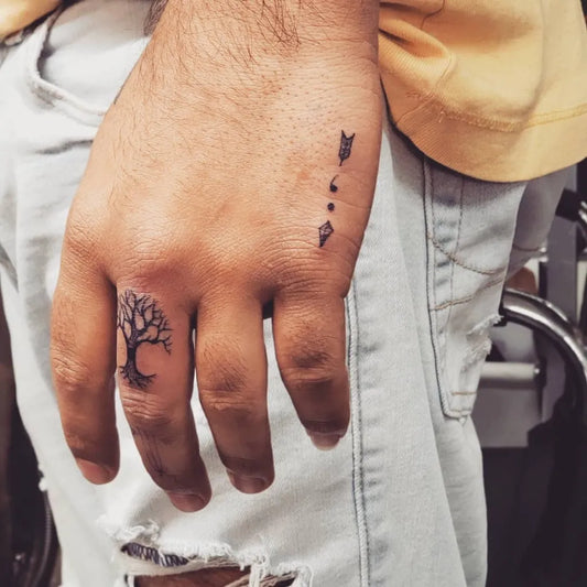Small Minimalist Tree Semicolon Arrow on Men Hand Tattoo by @ebonydawnx