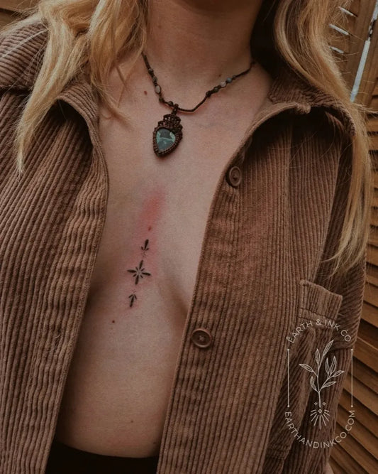 Small Minimalist Turquoise Pendant and Three Stars on Women Sternum Tattoo by @earth.and.ink.co