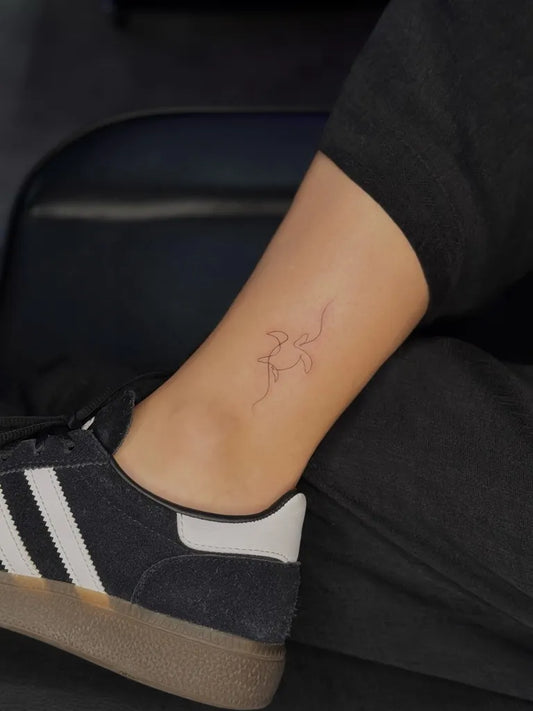 Small Minimalist Turtle Tattoo on Women Ankle by @alishatattooing