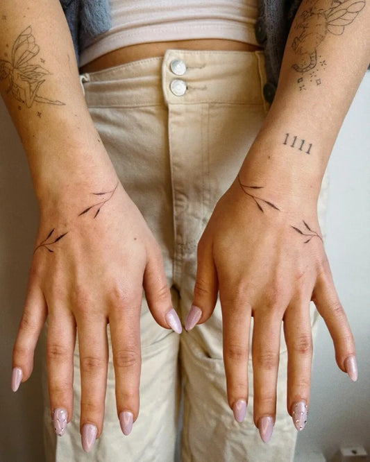 Small Minimalist Vine Branches on Women Wrists Tattoo by @vasia