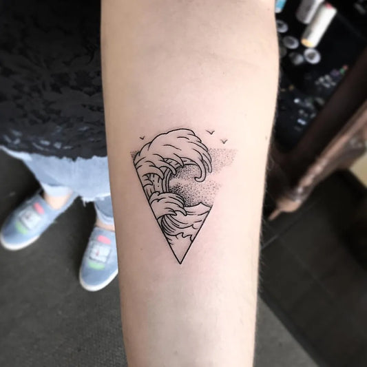 Small Minimalist Wave Tattoo on Women Arm by @luisfscouto