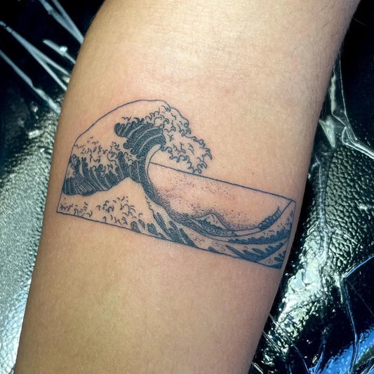 Small Minimalist Wave Tattoo on Women Forearm by @ney.tattoos