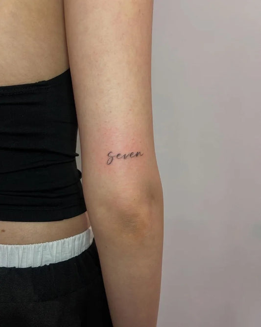 Small Minimalist Word on Women Arm Tattoo by @lucybethantattoos