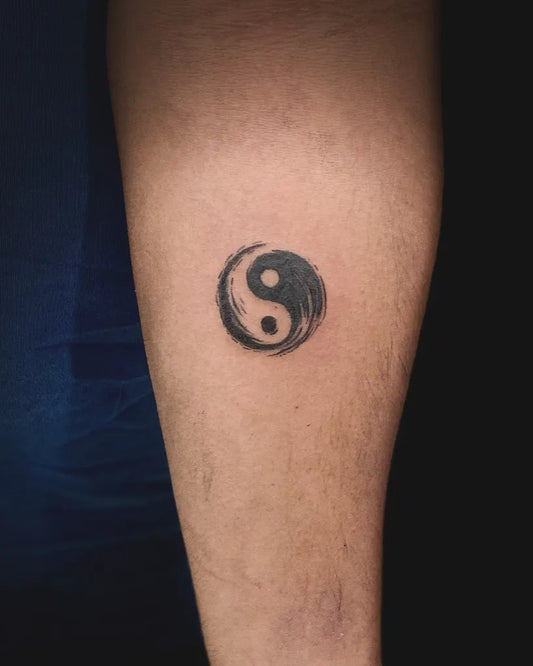Small Minimalist Yin Yang Tattoo on Men Arm by @artist_vamshi_