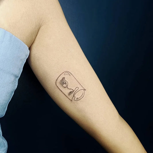 Small Minimalist jar with flower on Women Arm Tattoo by @eric_manio