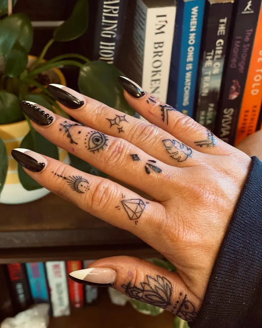 Small Mystic Symbols on Women Fingers Tattoo by @wildflower_hippiewitch