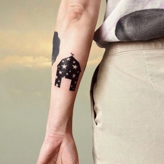 Small Negative Space Barn with Star Tattoo on Women Arm by @hemlocktattoostudio