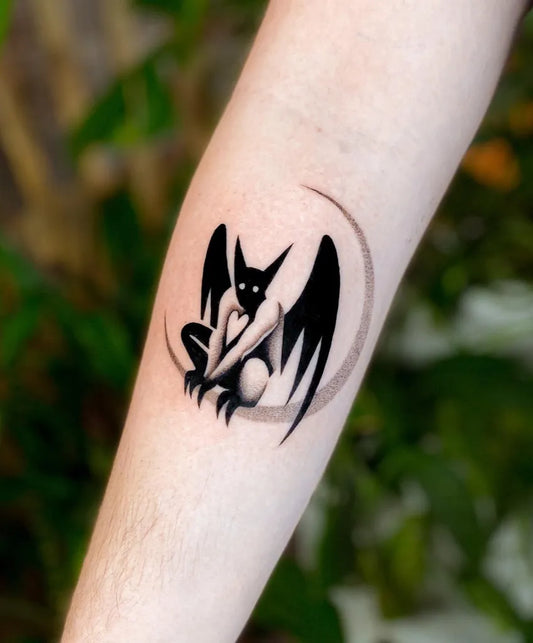 Small Negative Space Bat and Crescent Moon Tattoo on Women Forearm by @spirit.of.salt