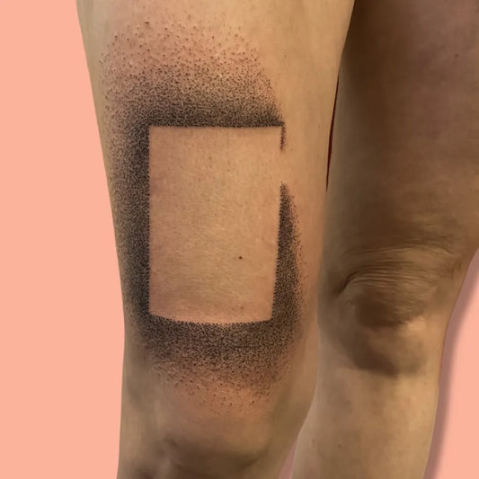 Small Negative Space Square Tattoo on Women Thigh by @sam.inky