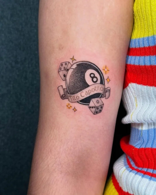 Small Neo Traditional 8 Ball and Dice Tattoo on Women Arm by @souplemon