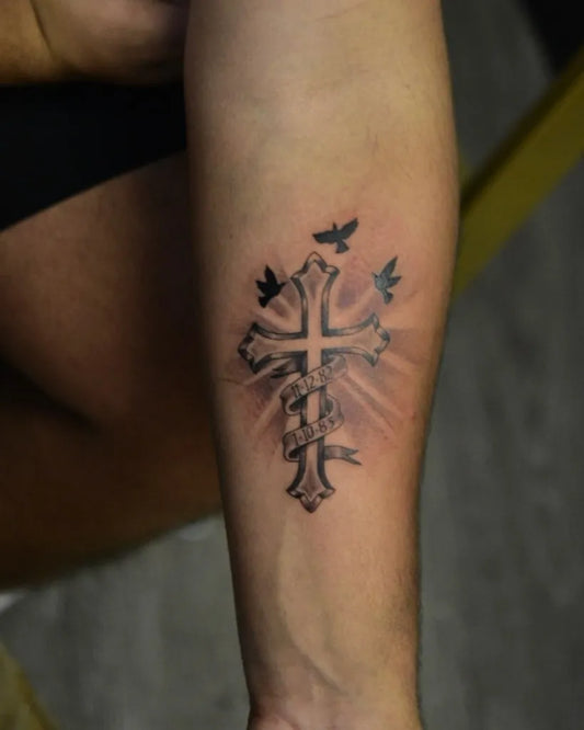 Small Neo Traditional Cross with Birds on Men Forearm Tattoo by @medeaner_tattoos