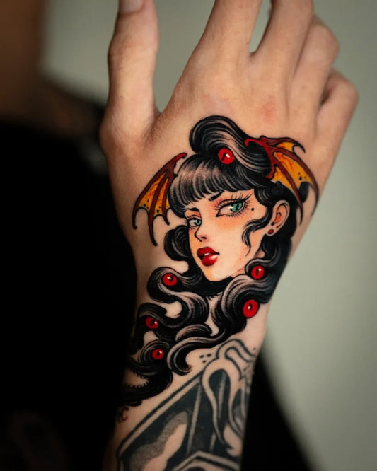 Small Neo Traditional Demon Woman with Wings on Men Hand Tattoo by @jin_qchoi