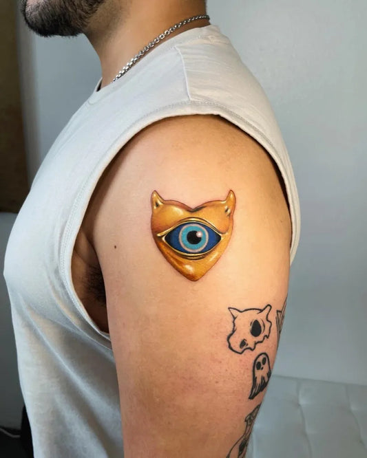 Small Neo Traditional Evil Eye Heart on Men Upper Arm Tattoo by @fabtatt