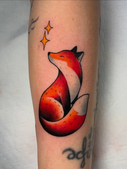 Small Neo Traditional Fox with Stars Tattoo on Women Arm by @federi.cat