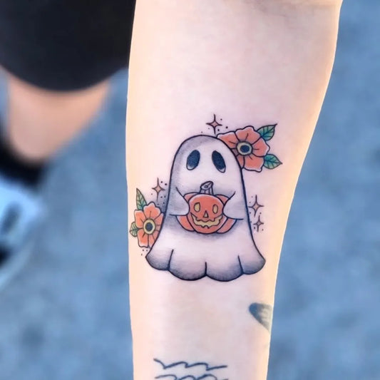 Small Neo Traditional Ghost with Pumpkin and Flowers Tattoo on Women Arm by @steveokills