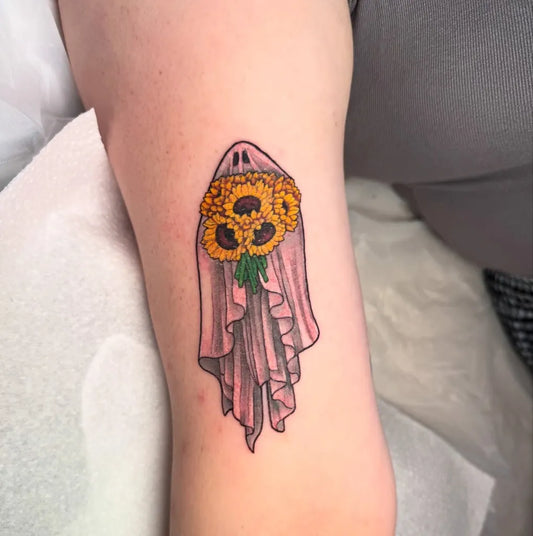 Small Neo Traditional Ghost with Sunflowers Tattoo on Women Arm by @moggtattoo