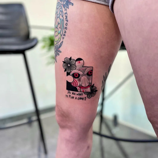 Small Neo Traditional Jigsaw Puzzle Horror Tattoo on Women Thigh by @abiloveless