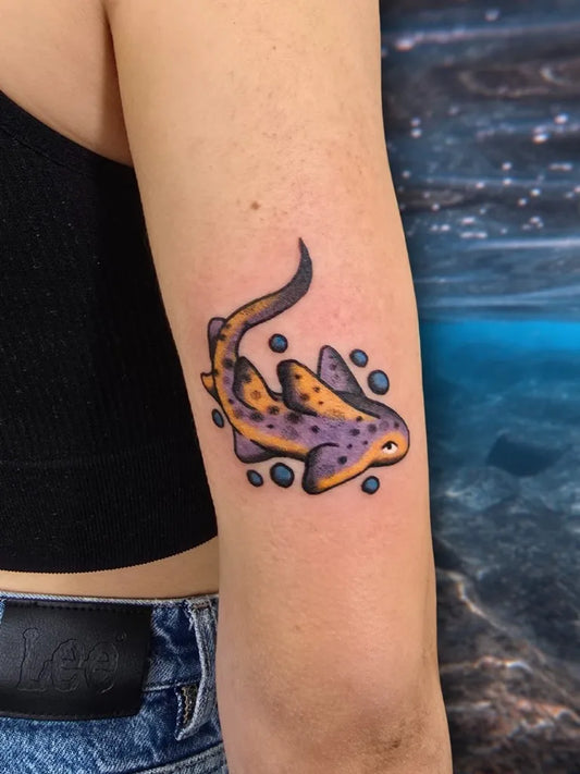Small Neo Traditional Leopard Shark on Women Arm Tattoo by @crucibletattooco