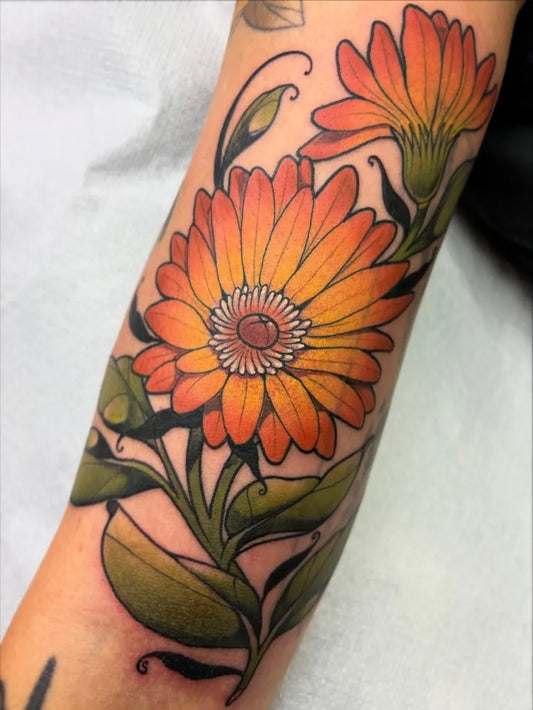Small Neo Traditional Orange Daisies with Leaves on Women Arm Tattoo by @mashav_tattoo